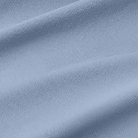 The Everywear Shirt Standard Length in Chambray Blue styled in a casual setting.