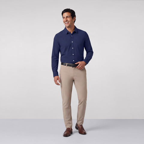 A secondary view of a man in the Everywear Shirt Standard Length in Navy.
