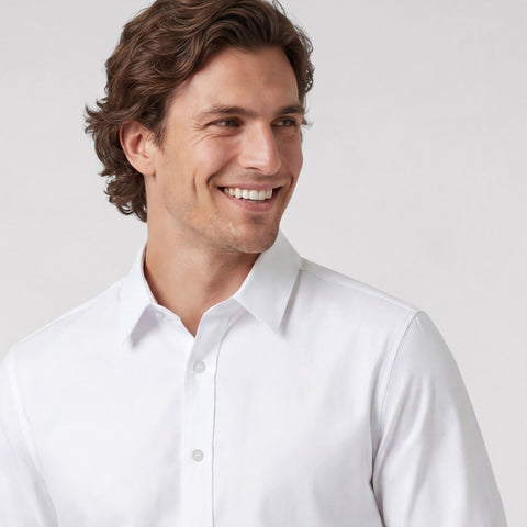 The Everywear Shirt Standard Length in True White, folded flat on a neutral background.