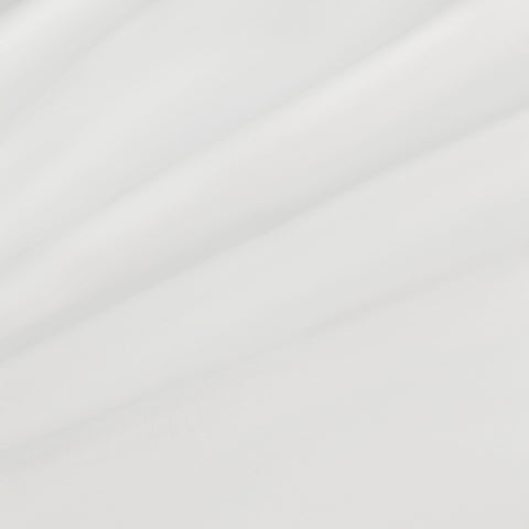 The Everywear Shirt Standard Length in True White styled in a casual setting.