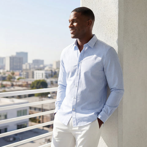 The Everywear Shirt Shorter Length in Fine Stripe worn in a lifestyle setting.