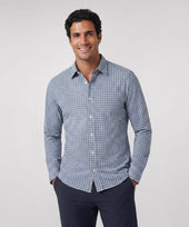 A man wearing the Everywear Shirt Shorter Length in Micro Check with a button-down collar.
