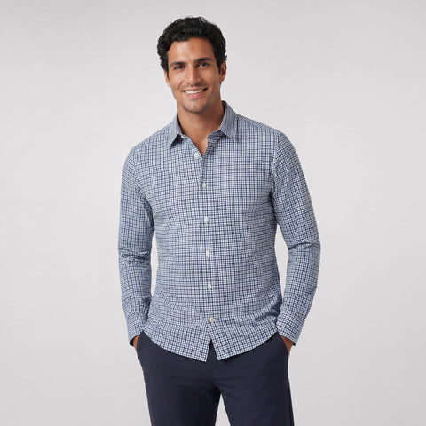 A man wearing the Everywear Shirt Shorter Length in Micro Check with a button-down collar.