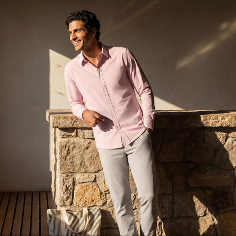 The Everywear Shirt Shorter Length in Soft Rose worn in a lifestyle setting.
