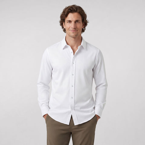 A man wearing the Everywear Shirt Shorter Length in True White with a classic fit.