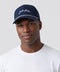 A man wearing the Archer Signature Hat in Navy