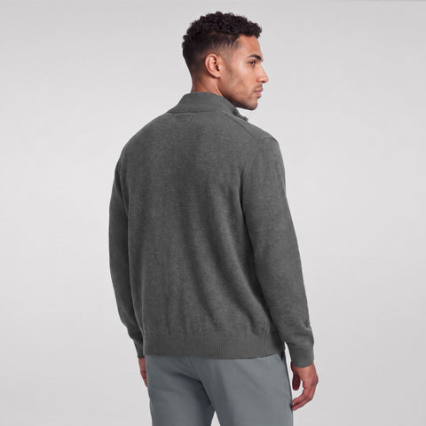 Back view of a heather gray full-zip sweater on a model.