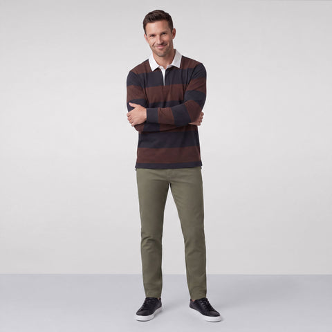 Alternate angle of a man in the Rugby Polo, Chicory and Dark Navy