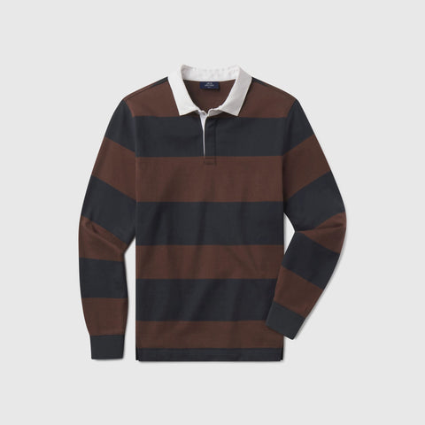 The Rugby Polo in Chicory and Dark Navy, laid flat on white