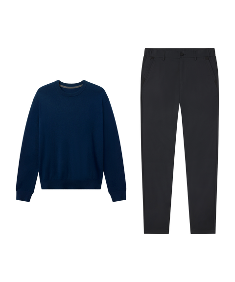 Travel outfit flat lay: Anytime Crewneck Sweater in Deep Blue paired with black pants
