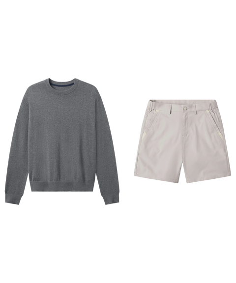 Heather gray crewneck sweater paired with pale stone shorts, shown flat.