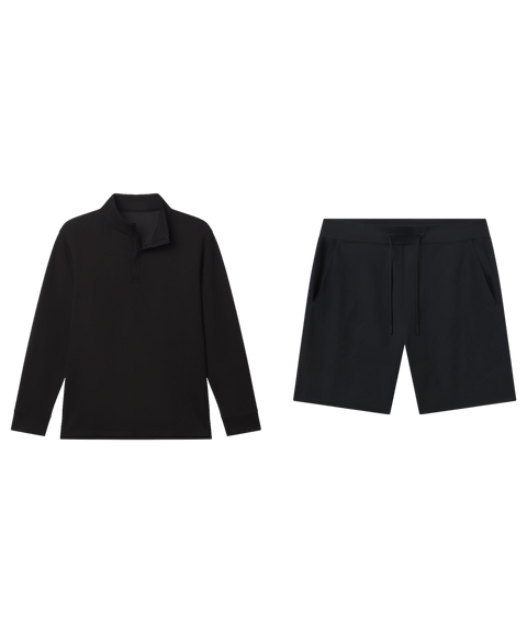 Black quarter-zip pullover paired with black drawstring shorts, shown flat.