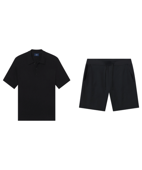 Black knit polo paired with black drawstring shorts, shown flat.