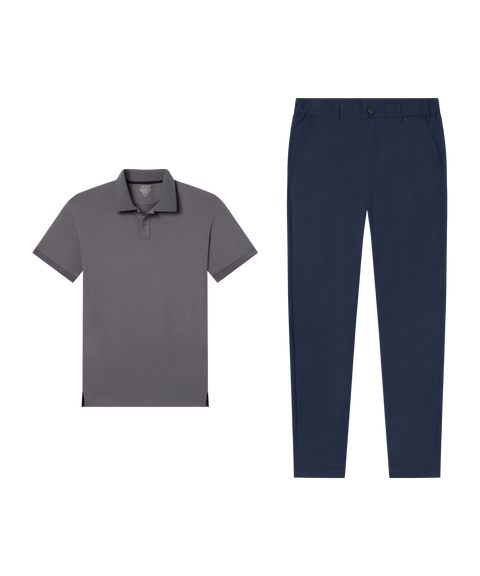 Travel outfit flat lay: Clubhouse Pique Polo in Charcoal Gray paired with navy pants