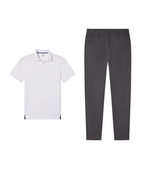 Travel outfit flat lay: Clubhouse Pique Polo in True White paired with charcoal pants