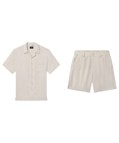 Cream linen camp-collar shirt paired with matching cream shorts, shown flat.