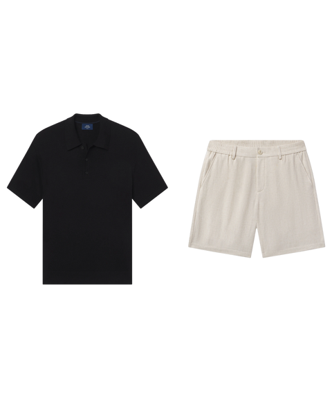 Black knit short-sleeve polo paired with oatmeal linen shorts, shown flat.