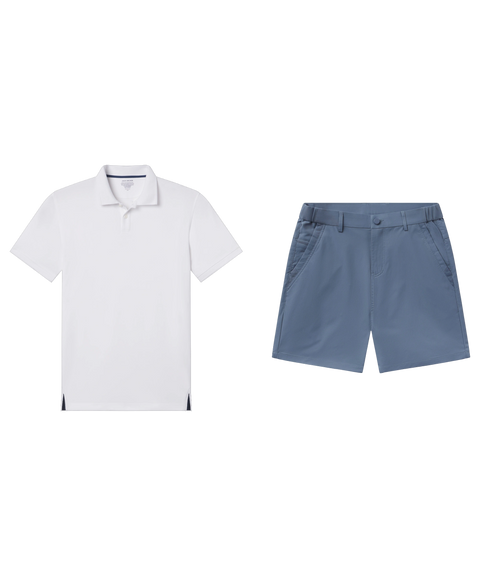 White pique polo paired with slate blue shorts, shown flat.