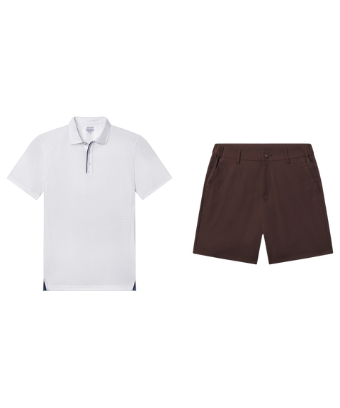 White textured performance polo with navy placket paired with dark brown shorts, shown flat.
