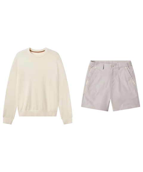 Cream crewneck sweater paired with pale grey flat-front shorts, shown flat.