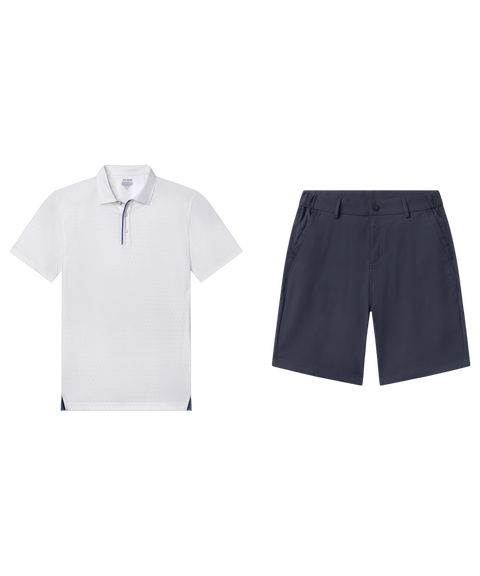 Textured white performance polo paired with navy flat-front shorts, shown flat.