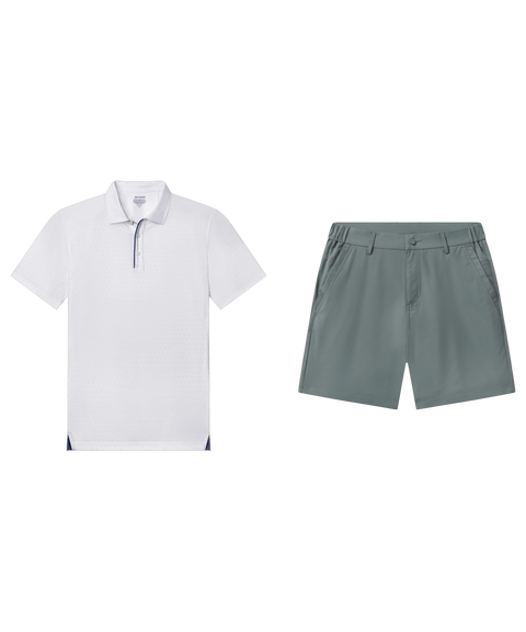 White textured polo with navy placket trim paired with slate green shorts, shown flat.